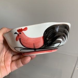 Unique ceramic bowl with rooster painting and scallop style lip.